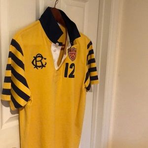“RUGBY” Polo by Ralph Lauren.